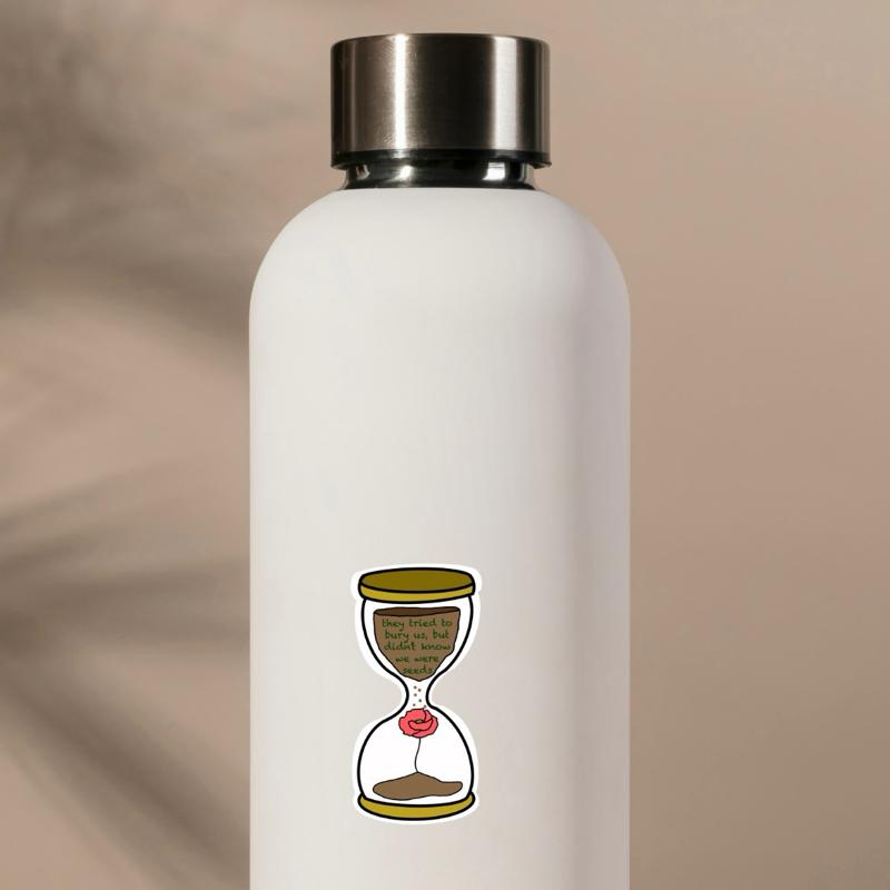 White water bottle with a sand hourglass design on a beige background
