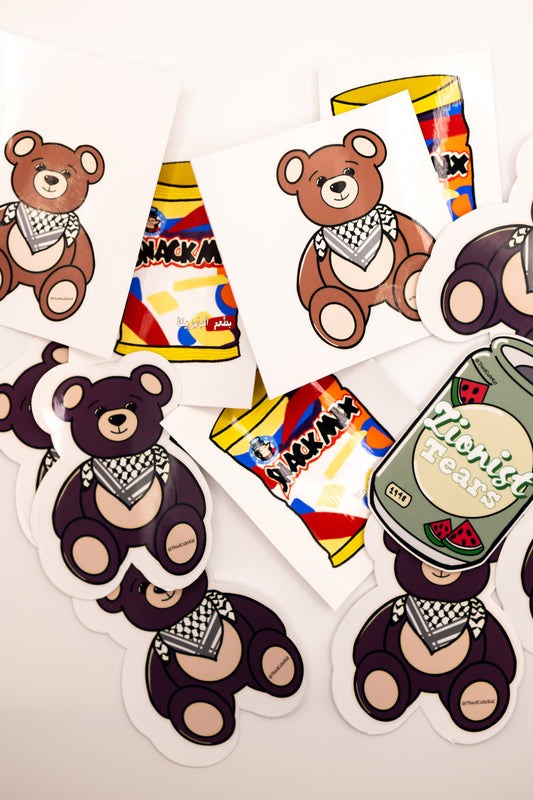 Stickers of teddy bears with various accessories on a white background
