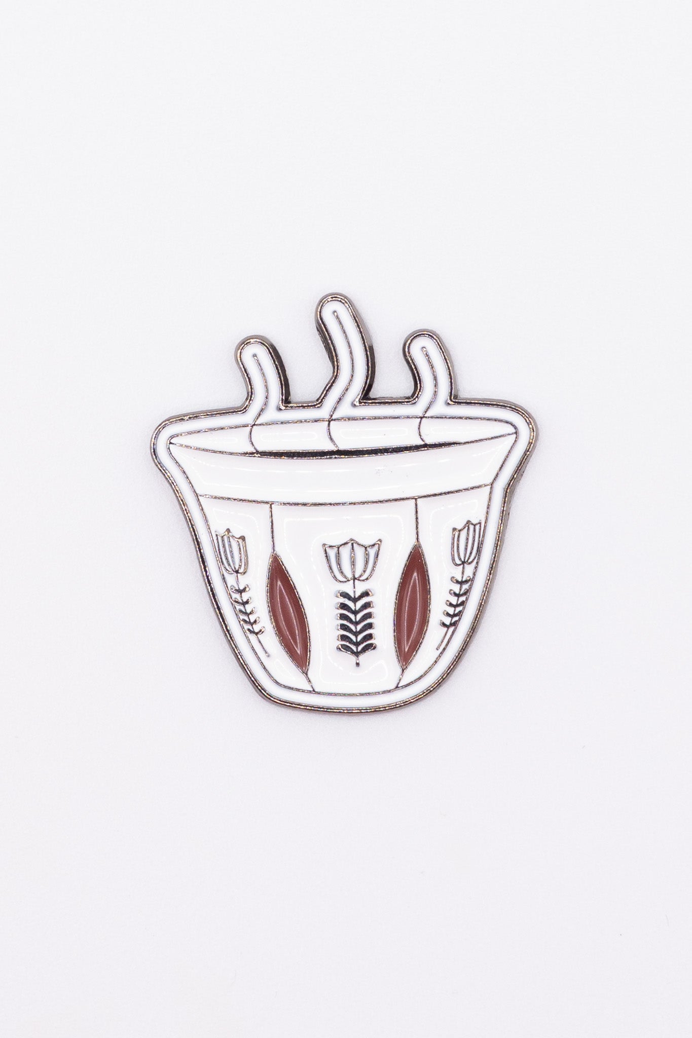 Decorative enamel sticker finjan qahwa arabic coffee cup with floral patterns on a white background