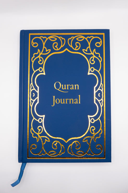 Blue Quran journal with gold decorative elements on a white background