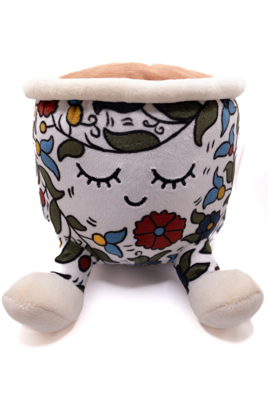 Plush finjan Qahwah cup with floral Khalili Palestine pattern and face on a white background