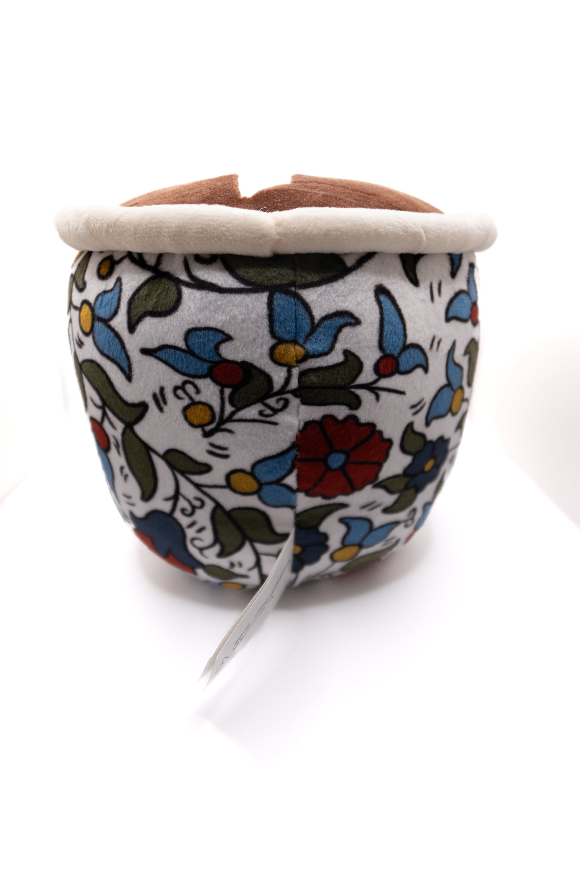 Plush finjan Qahwah cup with floral Khalili Palestine pattern and face on a white background with palestine map