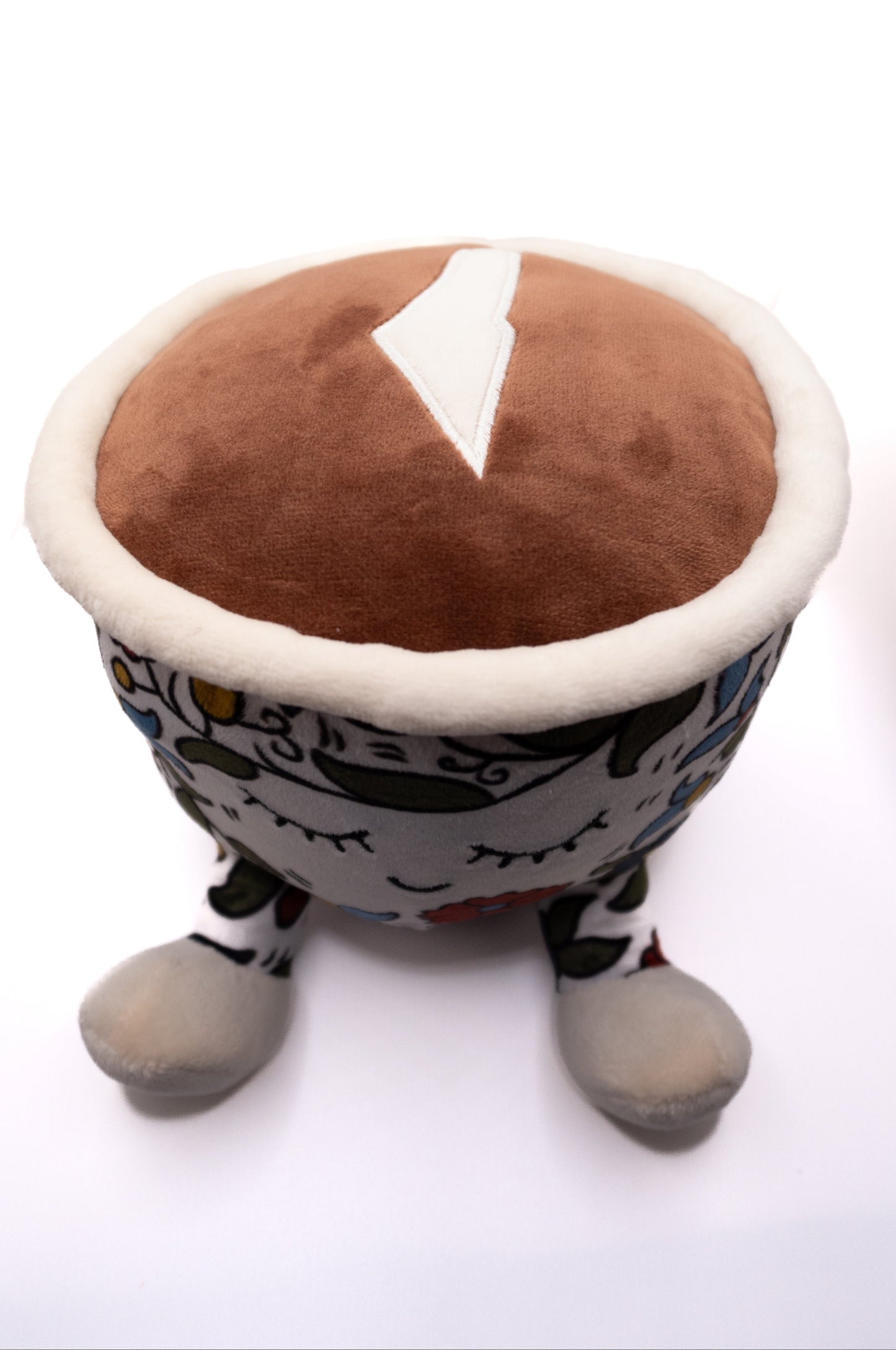 Plush finjan Qahwah cup with floral Khalili Palestine pattern and face on a white background with palestine map